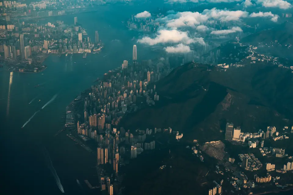 Aerial view city harbor skyline mountain bay clouds urban coast