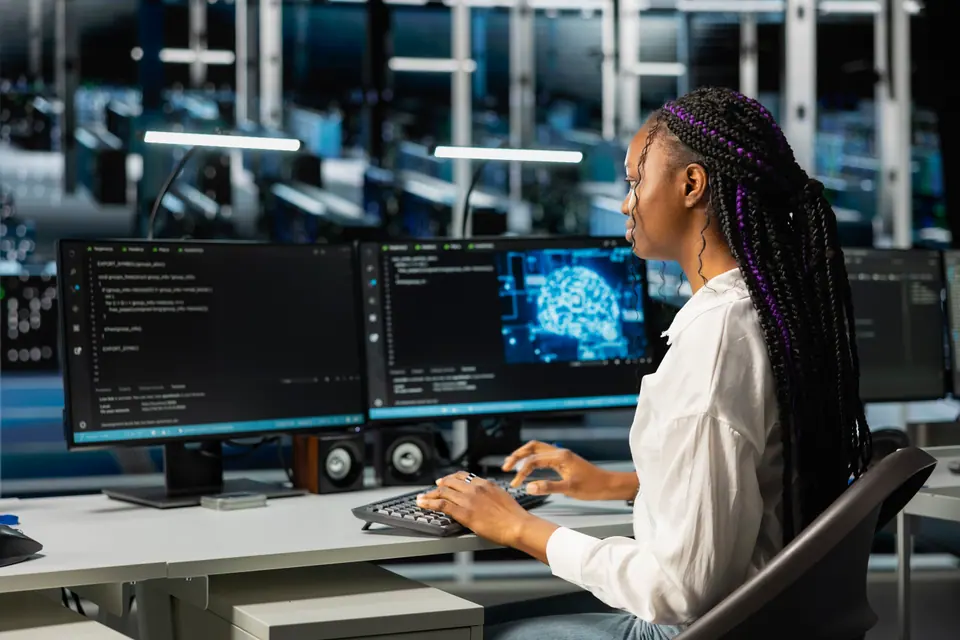 Data center admin running simulations for neural network forecasting, tracking performance