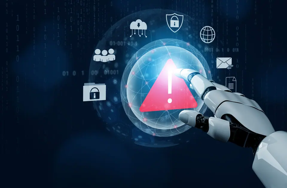 A robotic hand reaches for a warning alert symbol, surrounded by digital icons representing cybersecurity threats, highlighting the importance of data…