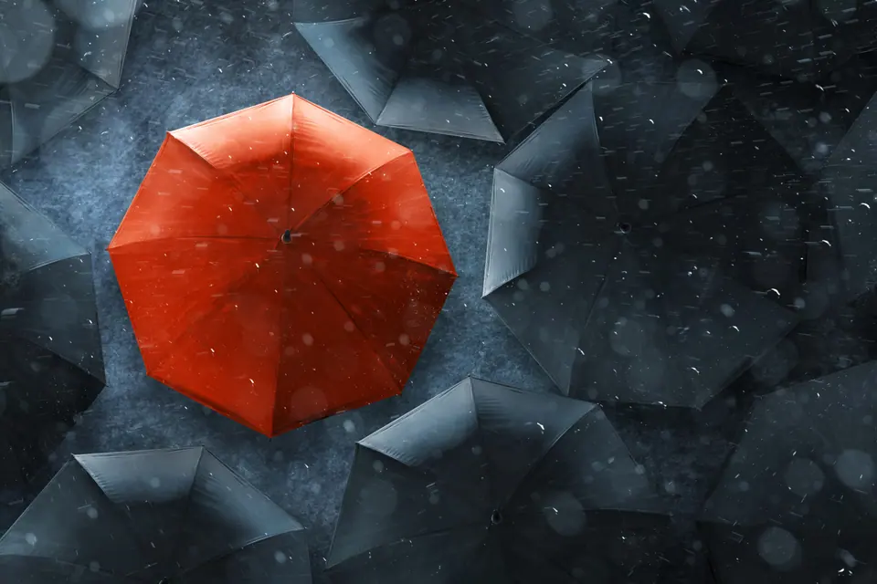 Top view umbrella on the street with asphalt road background