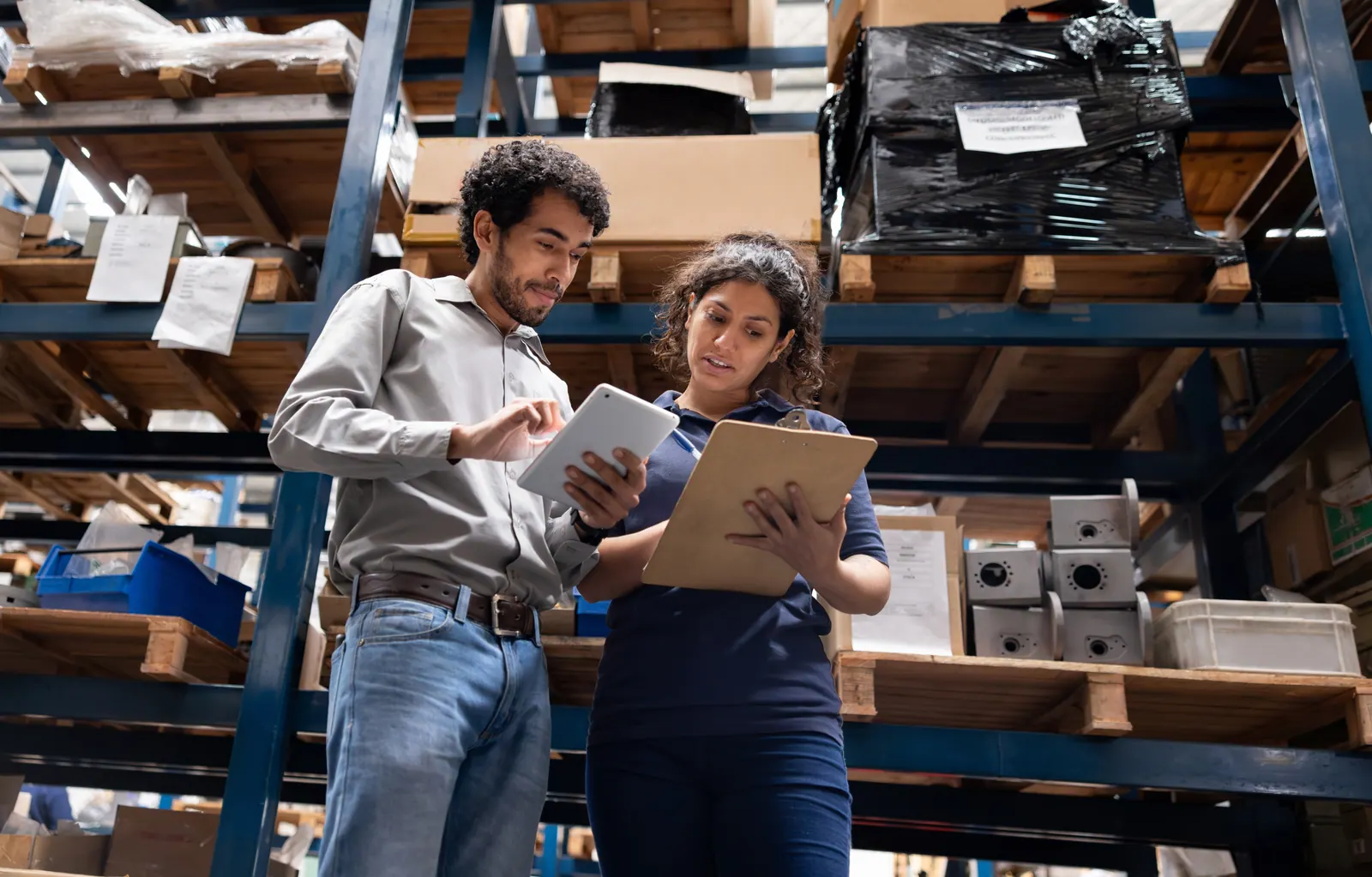 Retail colleagues checking information on a tablet